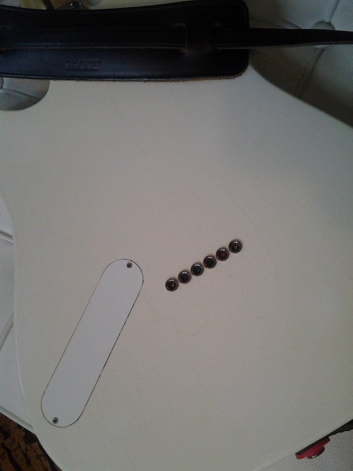 Crazy clean preamp cavity criss-crossing the top control cavity. The 9 volt is held perfectly in place by the walls of the cavity.